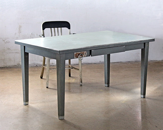Gray Metal Interrogation Desk