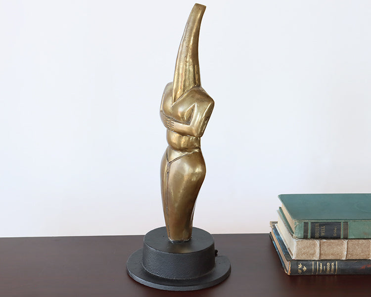 Gold Figure on Black Metal Base