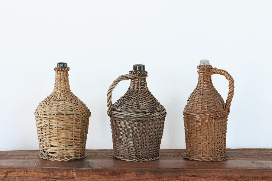 Small Wicker Covered Wine Bottle