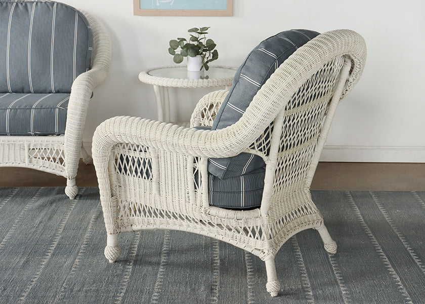 White Wicker Arm Chair with Blue and White Cushion