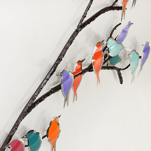 Multicolored Steel Birds on a Branch - Cleared