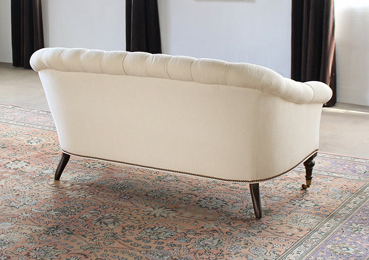 Tufted Loveseat in Linato Cream with Brass Nailhead Trim