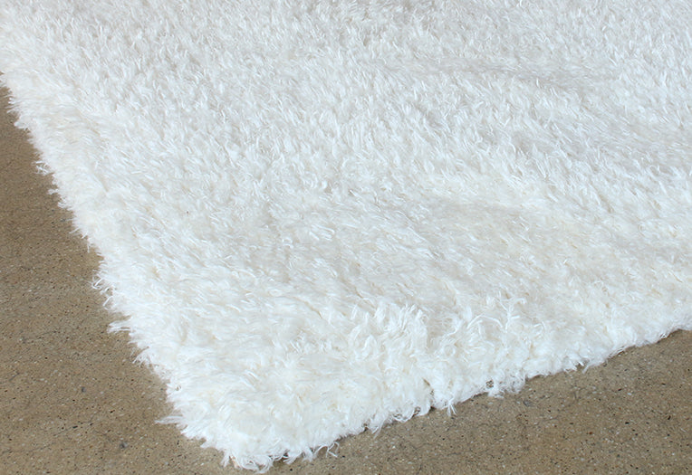 7' 9" X 9' 9" Ivory Shag Rug