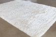 RUG424 - 9'3 X 13' Ivory Three Inch Pile Shag Rug