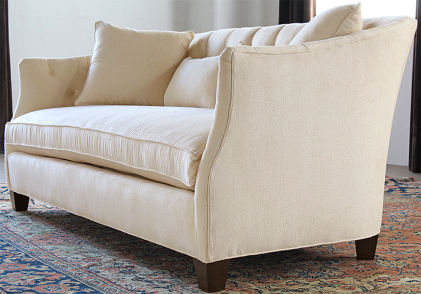 Curved Sofa with Tufted Back in Linato Cream