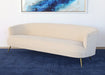 SF239 - Curved Sofa With Tight Back And Antique Brass Legs