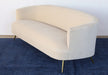 SF239 - Curved Sofa With Tight Back And Antique Brass Legs