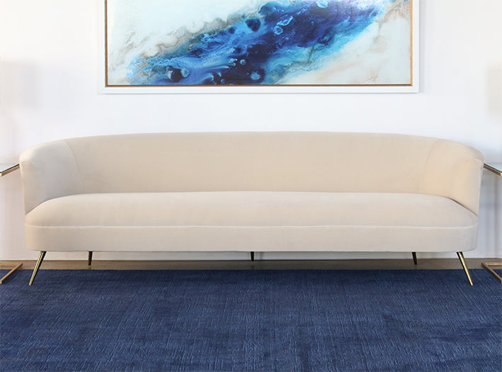 SF239 - Curved Sofa With Tight Back And Antique Brass Legs