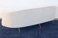 SF239 - Curved Sofa With Tight Back And Antique Brass Legs