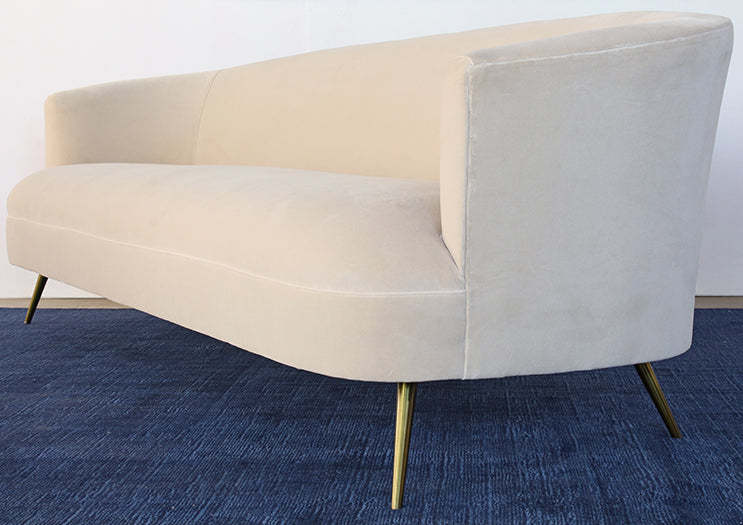SF239 - Curved Sofa With Tight Back And Antique Brass Legs